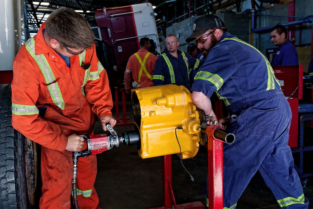 Students working with machinery